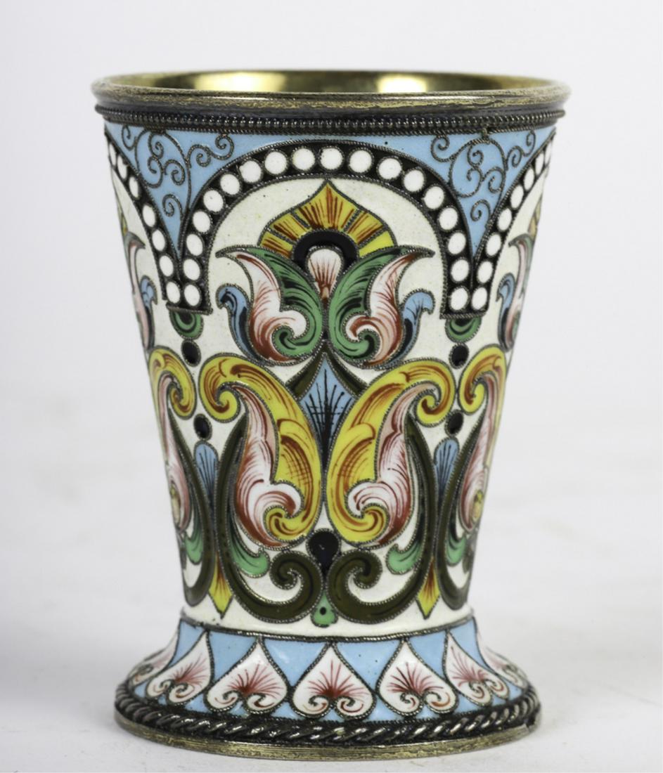 ANATOLY A. ARTSYBASHEV ENAMELED SILVER-GILT CUP: Finely crafted enamel work with stylized flowers on a light blue and white ground outlined with milgrain and roping. 2 1/4 inches. Moscow. 2 troy ounces