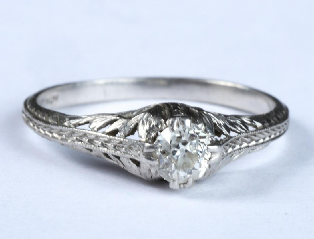 ART DECO DIAMOND and PLATINUM ENGAGEMENT RING: .3 Ct diamond solitaire cathedral set in platinum. size 8. 1.9dwt.