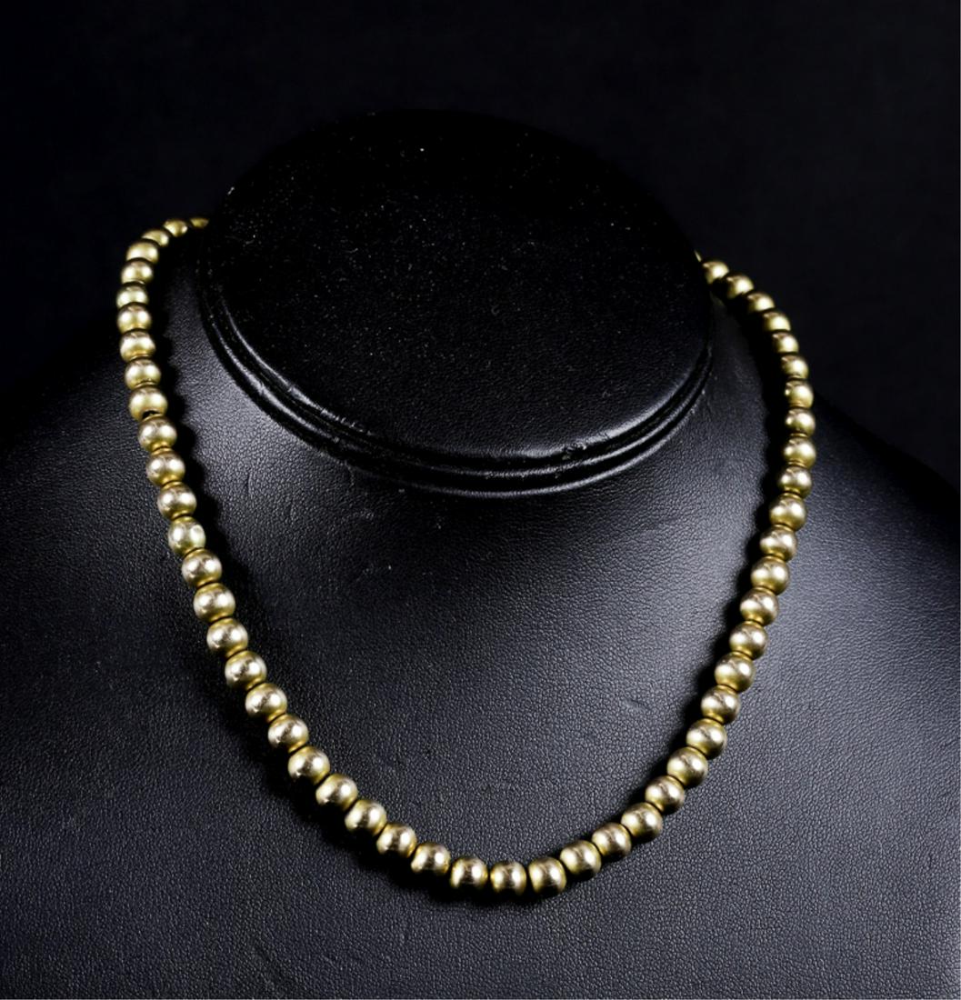 14k ROSE GOLD BEAD NECKLACE: 15inches. beads approx 1/4 inch. 12dwt.