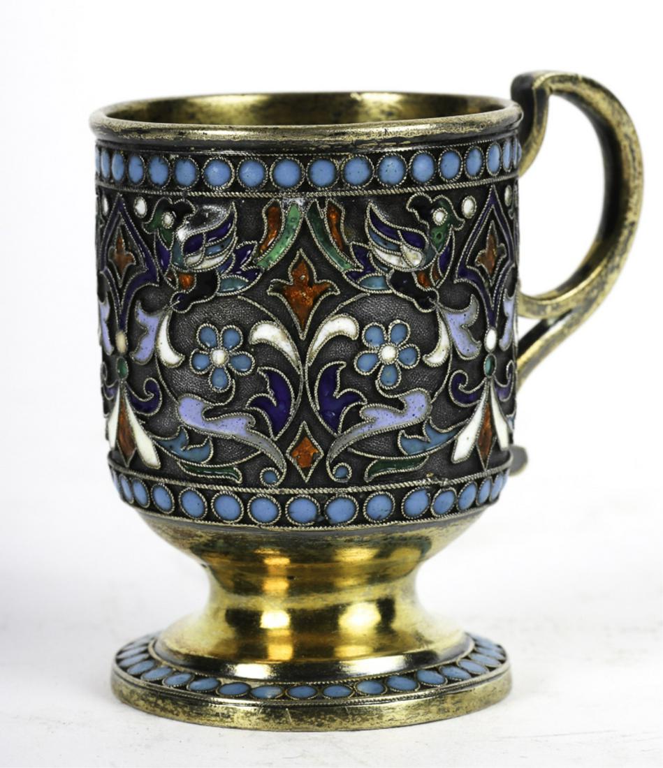 GUSTAV KLINGER ENAMELED GILT-SILVER CUP: Stlyized floral motif on a stippled ground and outlined with fine rope work. Moscow c 1860-1890 and hallmarked 84 silver. 2 1/4 inches. 2.17 troy ounces