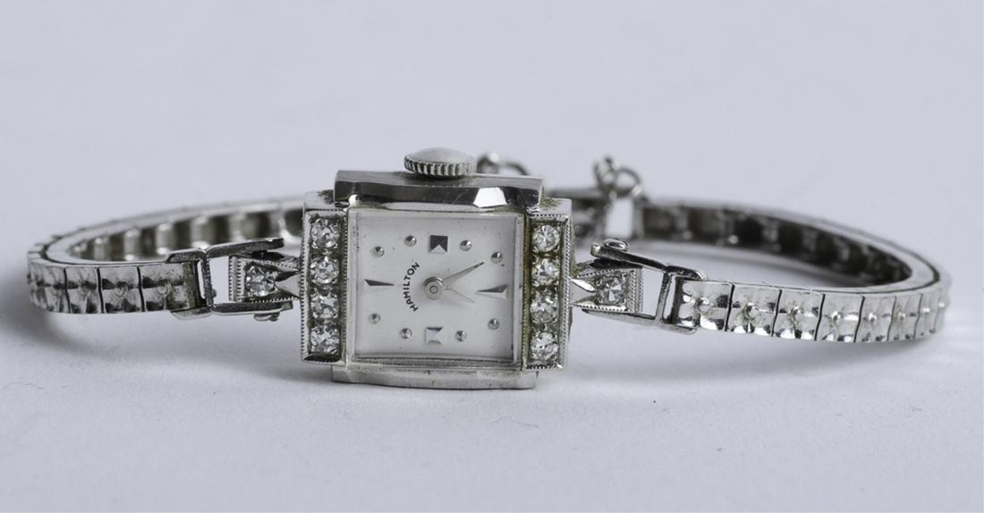 HAMILTON 14k WHITE GOLD and DIAMOND LADY'S WATCH: 3/4 x 1/2 inch case. 7 1/2 inches. marked 14k on band. 11.1 dwt
