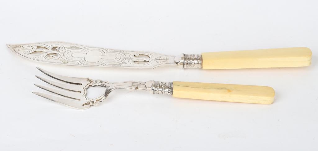 VICTORIAN SILVER PLATED FISH SET: Both fork and knife are engraved and pierced. unmarked 12 1/2 inches (and under)