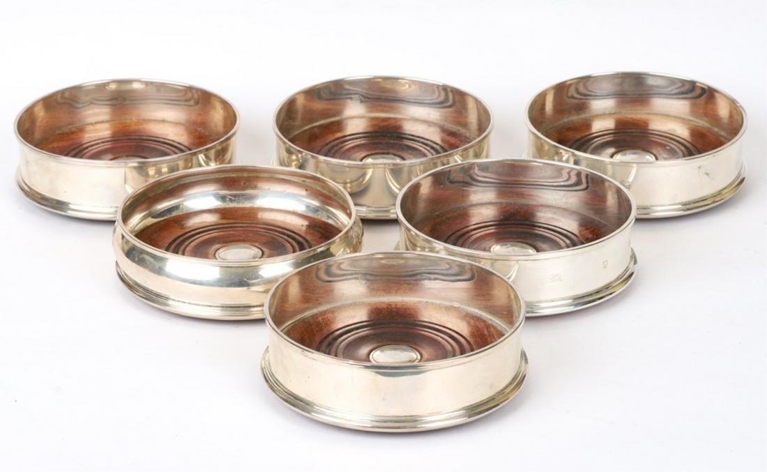 (6) MC HERSEY & SON STERLING SILVER WINE COASTERS: (5) Matching, (1) with rounded sides. 1 1/2 x 5 inches
