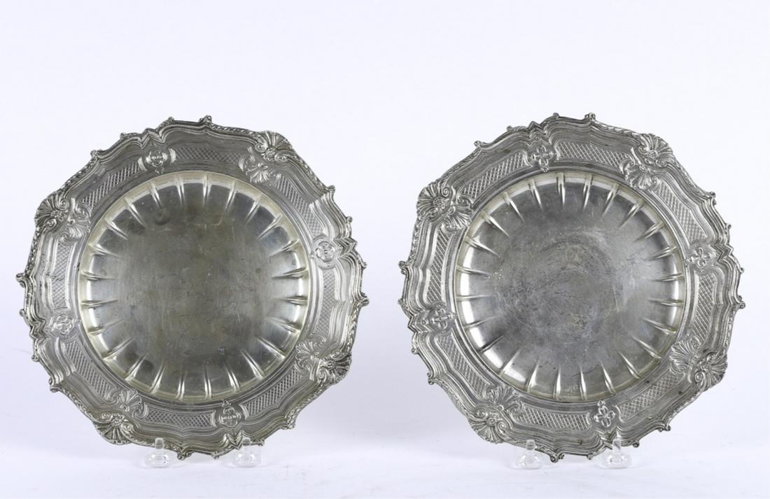 PAIR of LIONEL CHICHTON STERLING SILVER PLATES: Ribbed bowl with rim embossed with shells and diaper pattern. 9 1/4 inches. 29.36 troy ounces