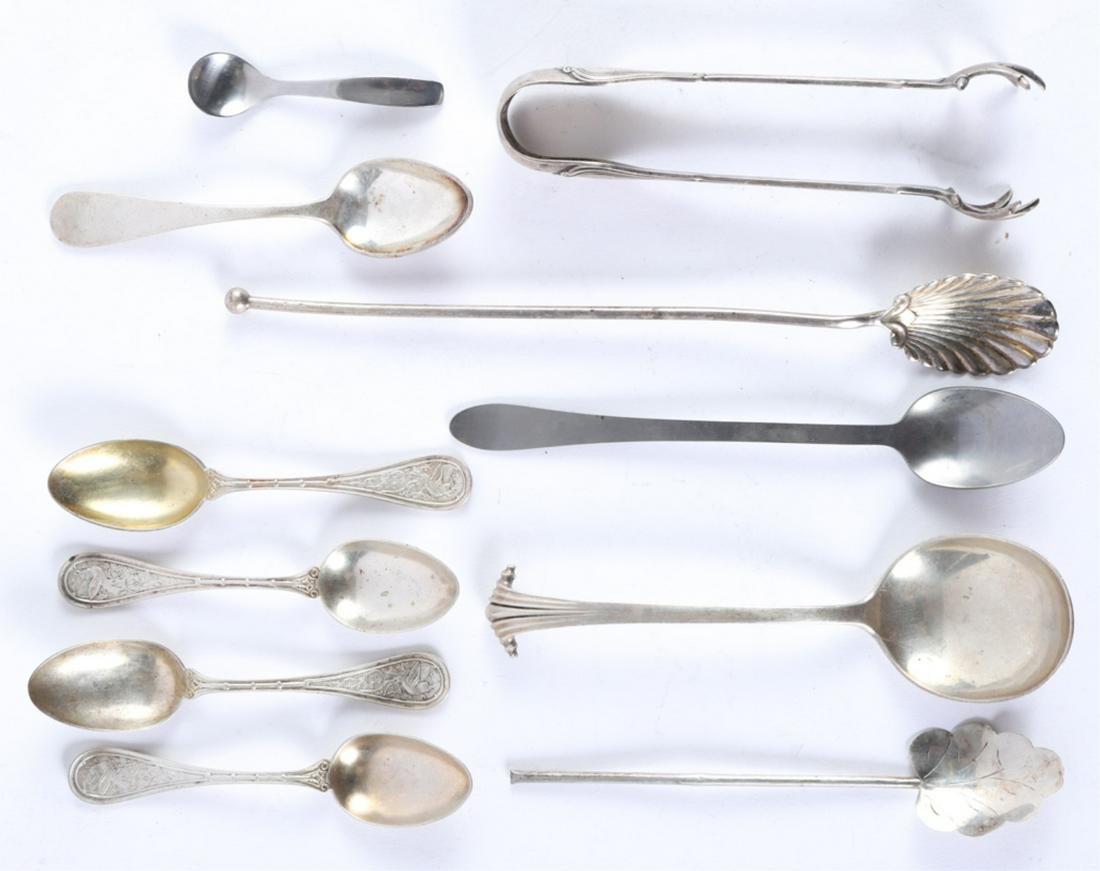 GROUPING OF STERLING SILVER TABLEWARES etc: Including: Arthur Stone spoon, (4) sterling demitasse spoons embossed with birds and floral motifs front and back and a pair of Gorham sugar tongs. 3.98 troy ounces Together with (5) assorted spoons. 