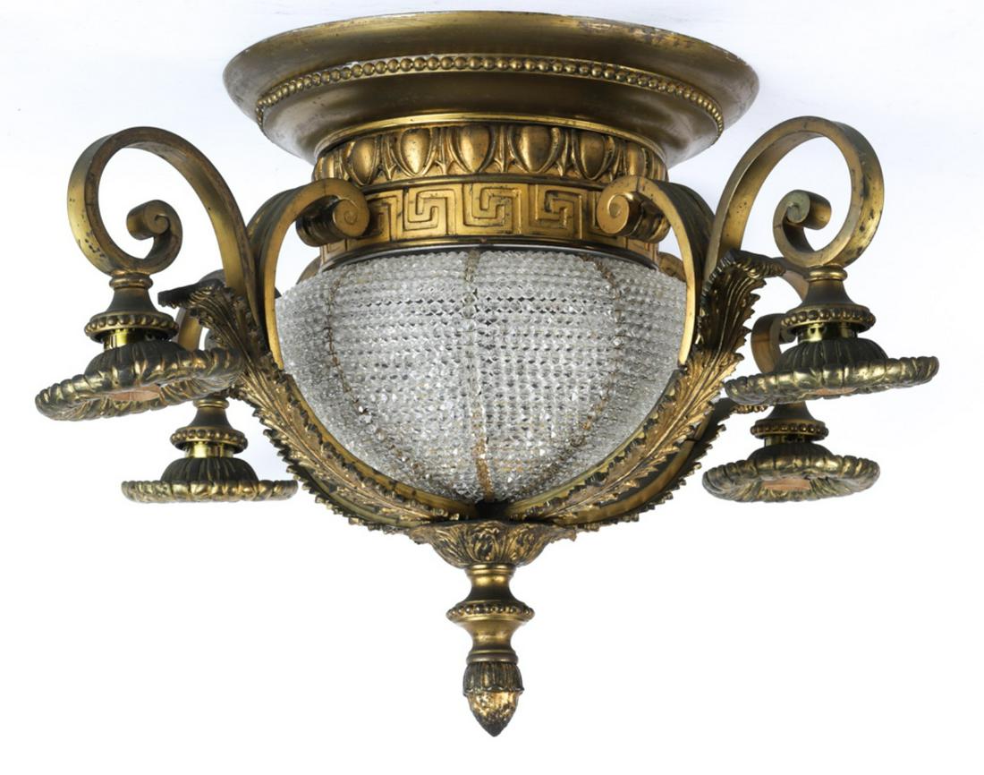 FINE QUALITY (6) LIGHT GILT BRONZE CEILING FIXURE: Scrolled acanthus leaf-embellished bronze frame supports (4) scrolled arms and glass globe covered with faceted beads and pineapple drop. 14 x 27 x 27 inches. .