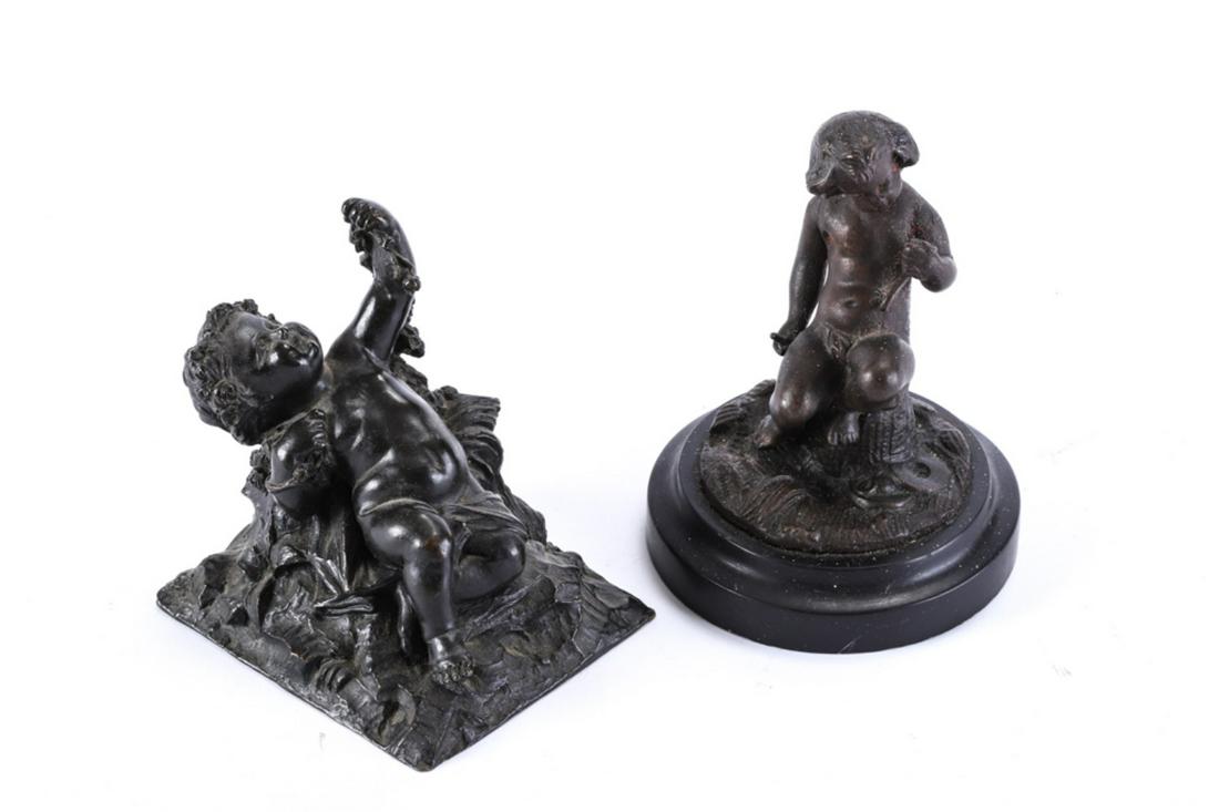 (2) BRONZE SCULPTURES OF PUTTI / CHERUBS: Including: One with a musical triangle and the second raising a bough of flowers. unsigned. 4 1/2 and 4 inches.