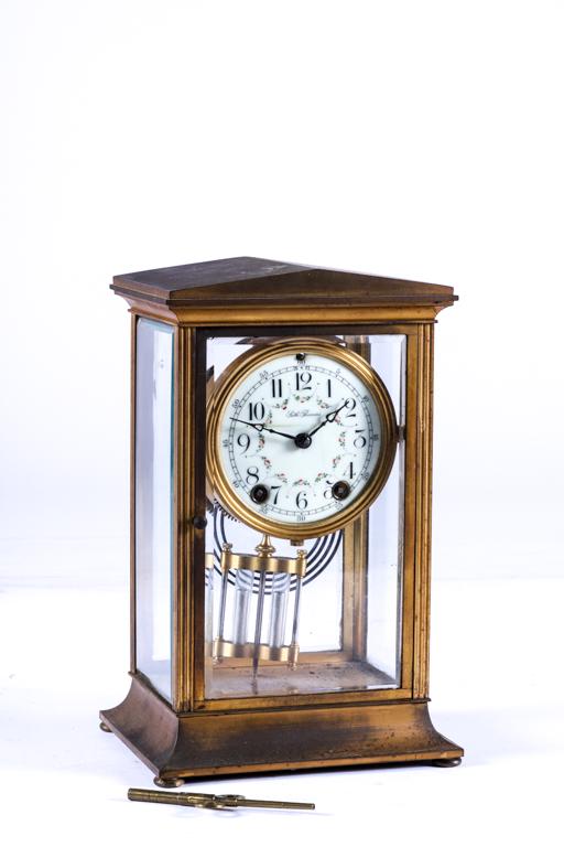 SETH THOMAS CRYSTAL REGULAR: (4) inch hand painted porcelain dial with chiming movement. Neo-classical influenced case. 11 1/4 inches.