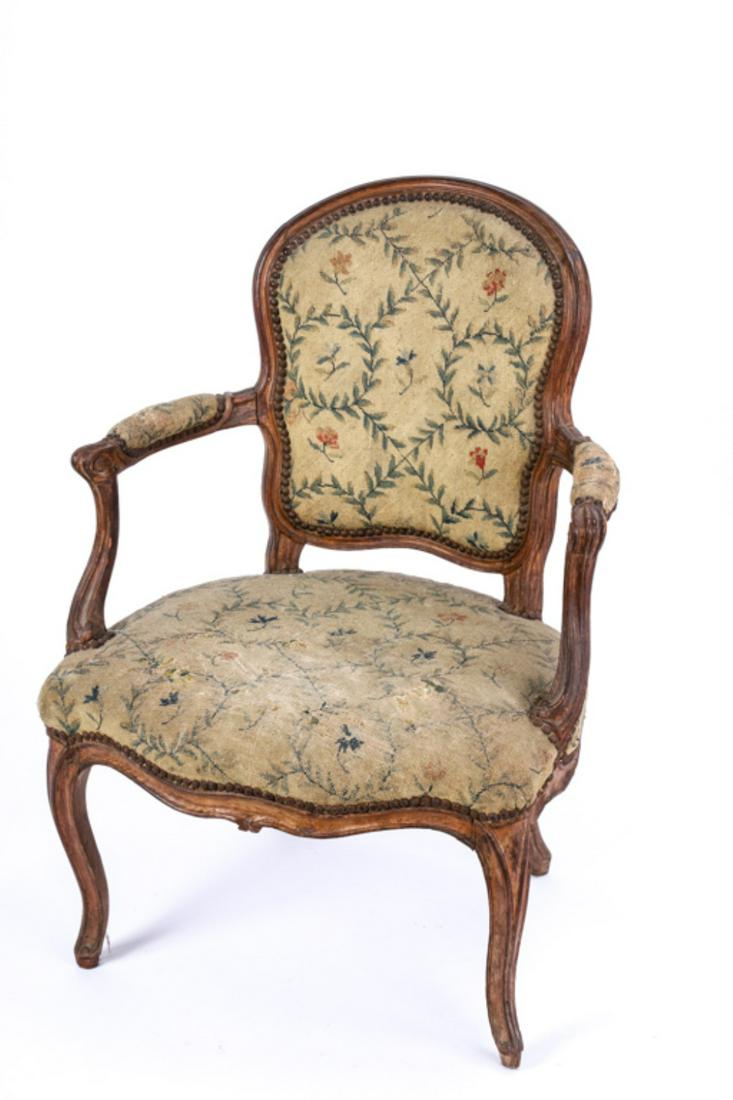 CLAUDE SENE (18th c) LOUIS XV UPHOLSTERED ARMCHAIR: Signed in chalk and stamped C-Sene under apron. Molded shield-form back and arms carved with volutes. Serpentine apron carved with small drop and raised on cabriole legs. 35 x 25 x 24 inches