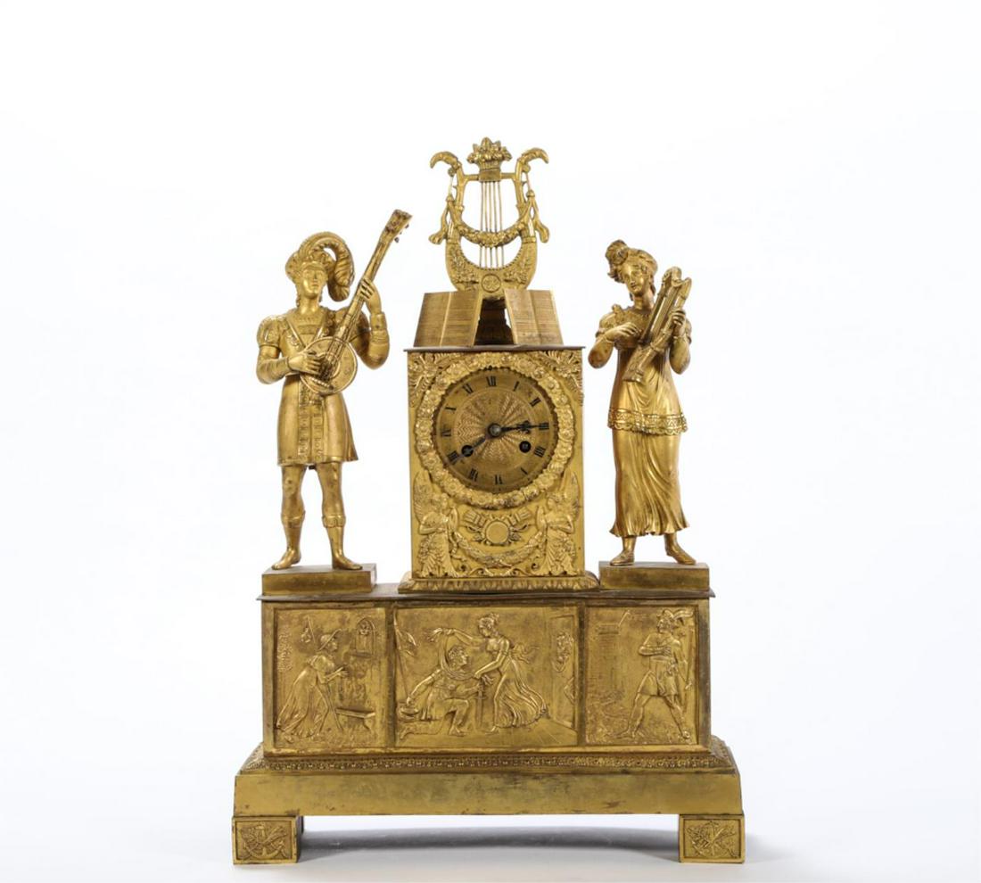 FRENCH DORE EMPIRE FIGURAL CLOCK: Music makers motif, 19”h