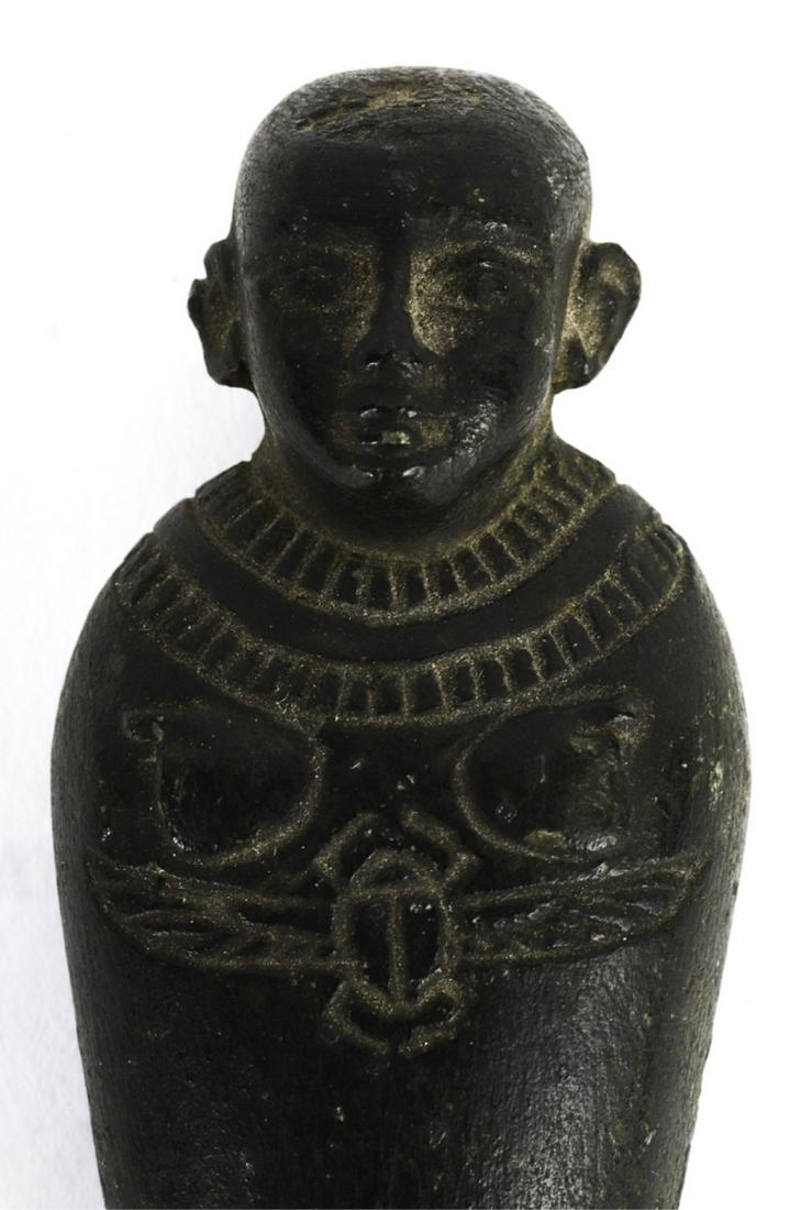 ANCIENT EGYPTIAN CARVED STONE SARCOPHAGUS: Probably black basalt inscribed with a winged scarab. 3 1/2 inches