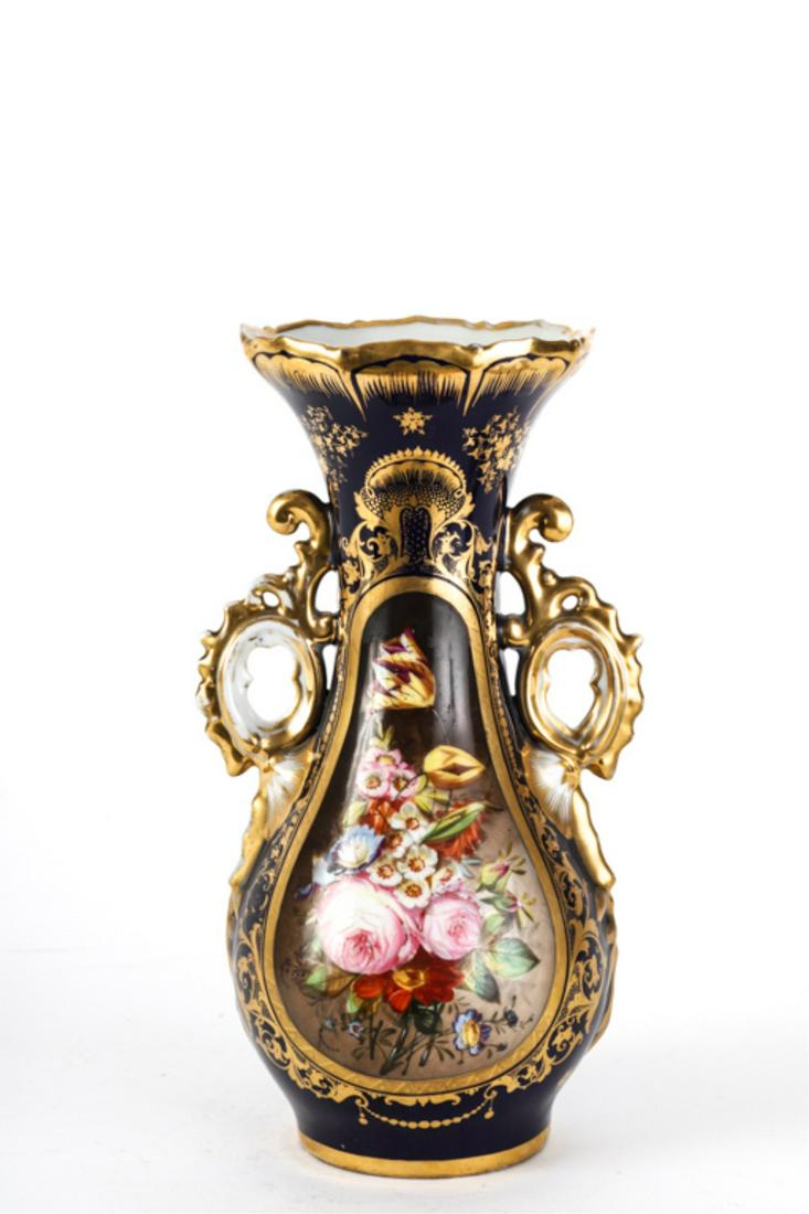 CONTINENTAL HAND PAINTED PORCELAIN VASE: Depicting a bouquet spray of flowers within a a gilt cartouche. unmarked. 13 1/2 inches.