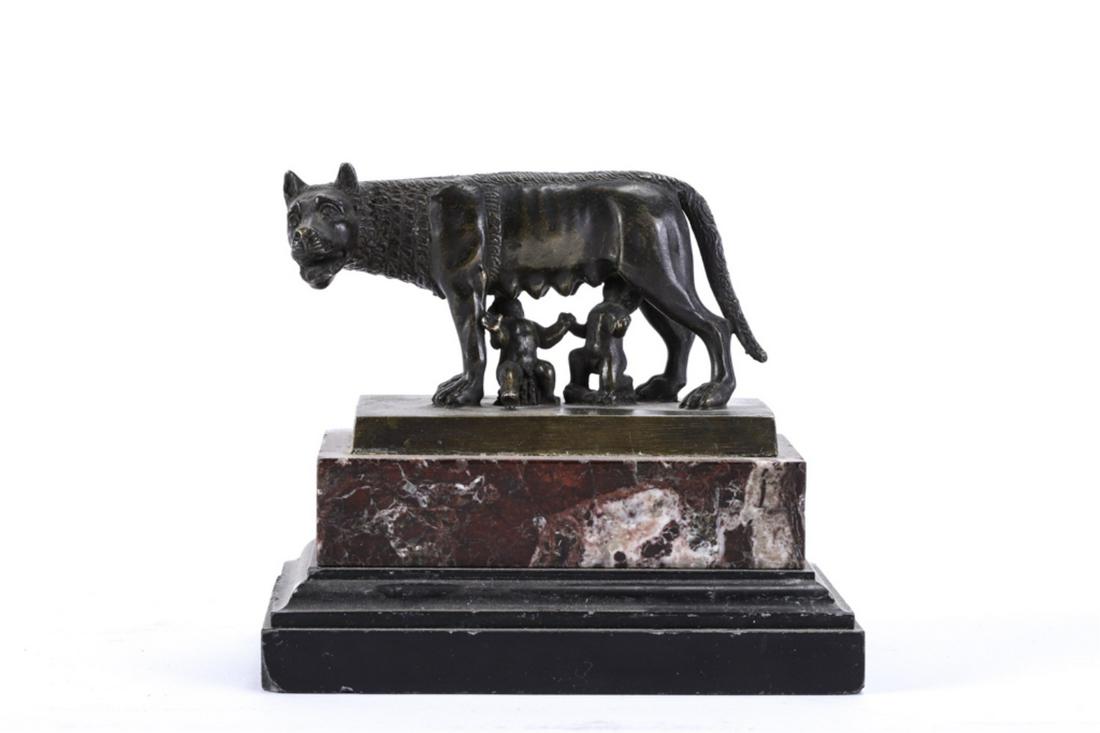 BRONZE MINIATURE of the CAPITOLINE WOLF: Unsigned. 4 x 4 1/2 x 3 inches including marble base.