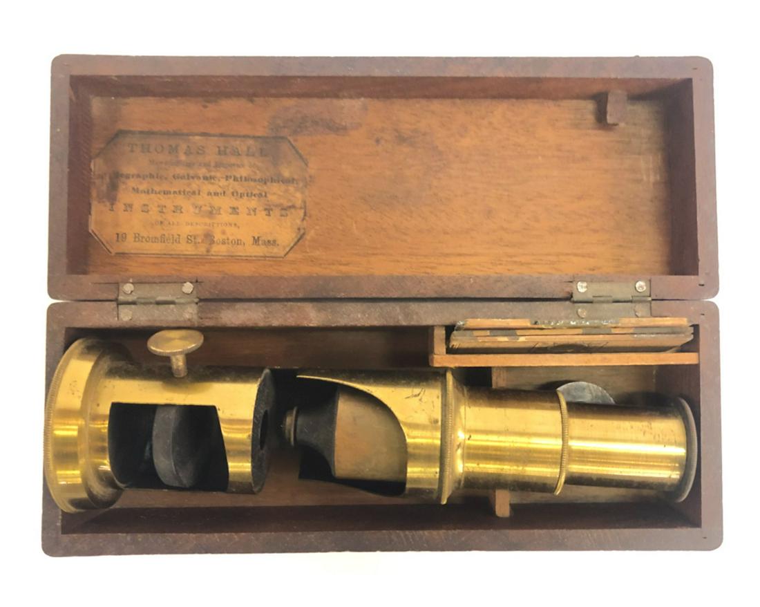 THOMAS HALL of BOSTON MICROSCOPE: In its original case with (3) specimen slides and second lens. 2 x 6 1/2 x 2 1/2 inches