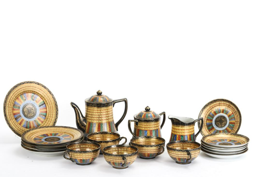 RS JAPAN PORCELAIN TEA SET and a SECOND: Including: Teapot, creamer, sugar, (5) plates, (5) tea cups and (6) saucers. Teapot 6 1/2 inches. Together with a blue and white porcelain teapot, and (6) cups and saucers.