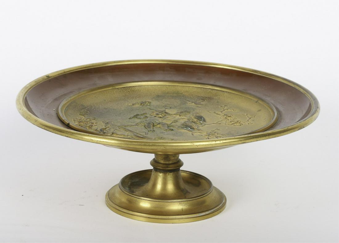 ANTIQUE FRENCH BRONZE TAZZA: Gilded bronze center scene of girl on tree branch w/ sheet music and flute. 3 birds are in tree and flying. Pedestal base unsigned. Some loss to gilding
