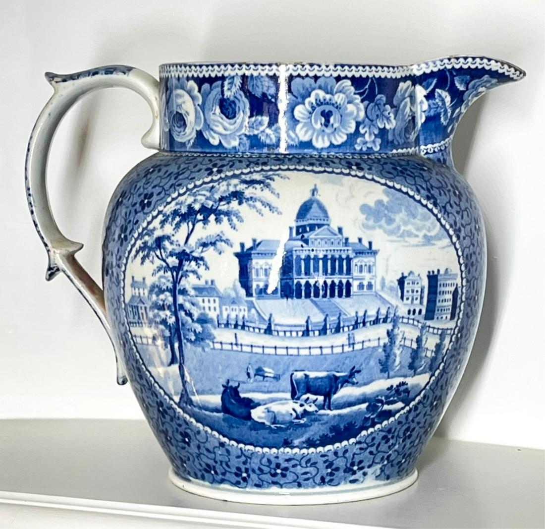 HISTORICAL STAFFORDSHIRE, BOSTON AND NEW YORK: Pitcher having transfer depicting a 19th century cartouches, a scene with cows in the foreground, the State House in the background, as well as New York City Hall, 7.5 inches high