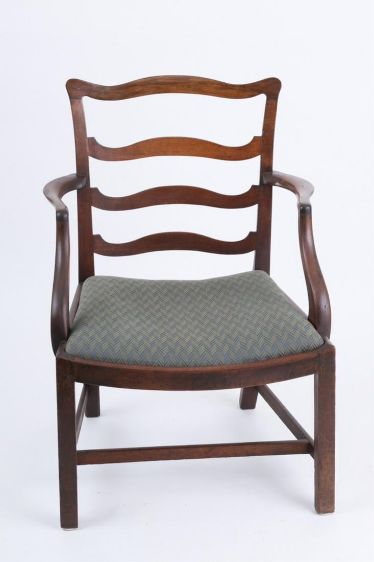 AMERICAN CHIPPENDALE RIBBON-BACK ARMCHAIR: mahogany with horizontal splats, scooped seat with trapezoidal slip seat, raised on Marlborough legs joined by stretchers, 18th century, 36 x 25 x 21 inches