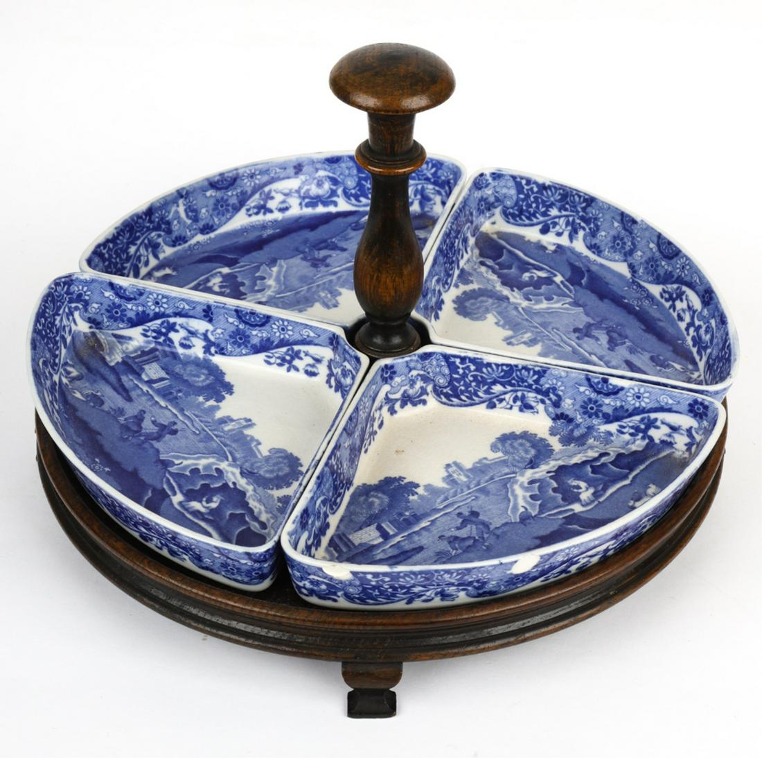 COPELAND SPODE HORS D'OEUVRES SET: Italian pattern, four sectional bowls with Italian landscapes with figures, on the original oak footed stand with turned handle and dished top, each section is 7 inches at the widest point, overall si
