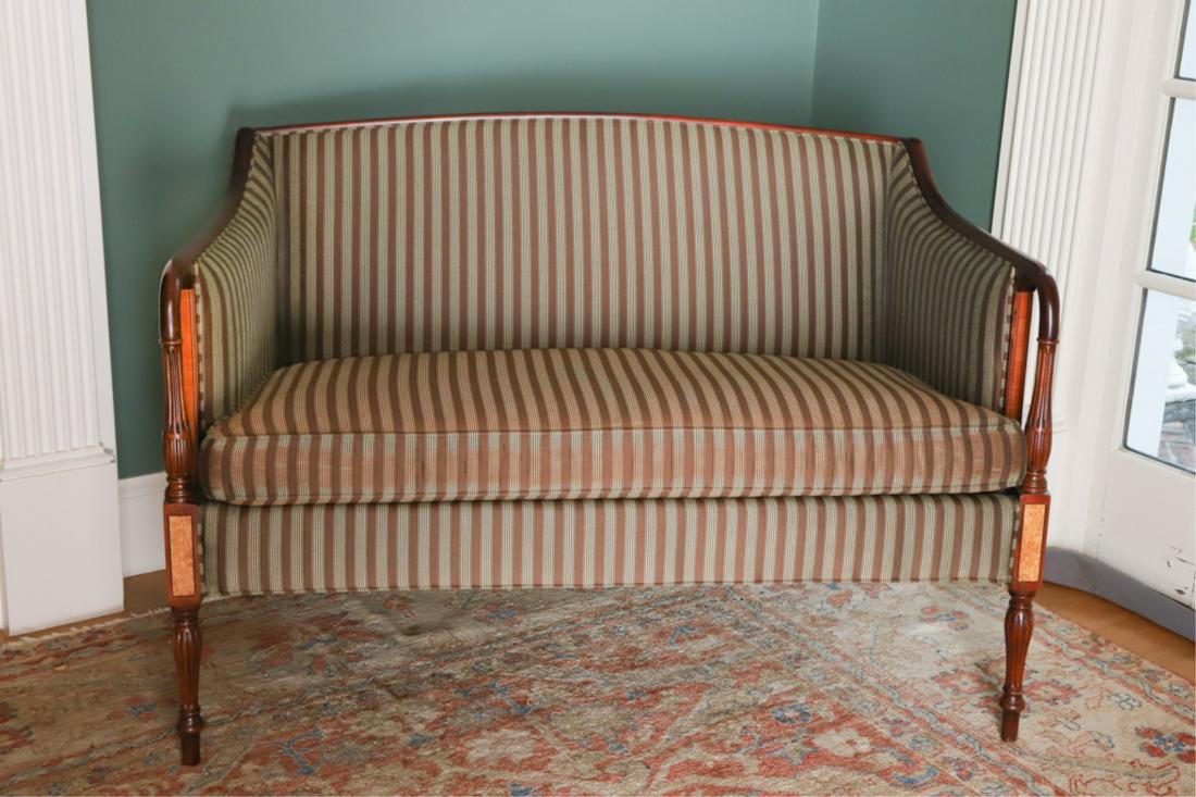 SHERATON STYLE MAHOGANY INLAID LOVESEAT: By Southwood, inlaid panels, striped fabric, 33 x 49.5 x 31