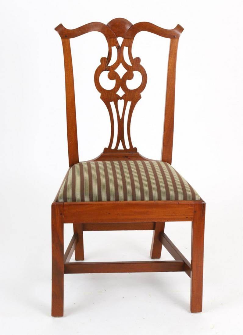 MASSACHUSETTS CHIPPENDALE SIDE CHAIR: Mahogany with carved crestrail above a pierced owl splat, trapezoidal slip seat above Marlborough legs, joined by stretchers, late 18th century, 39 x 21 x 17 inches