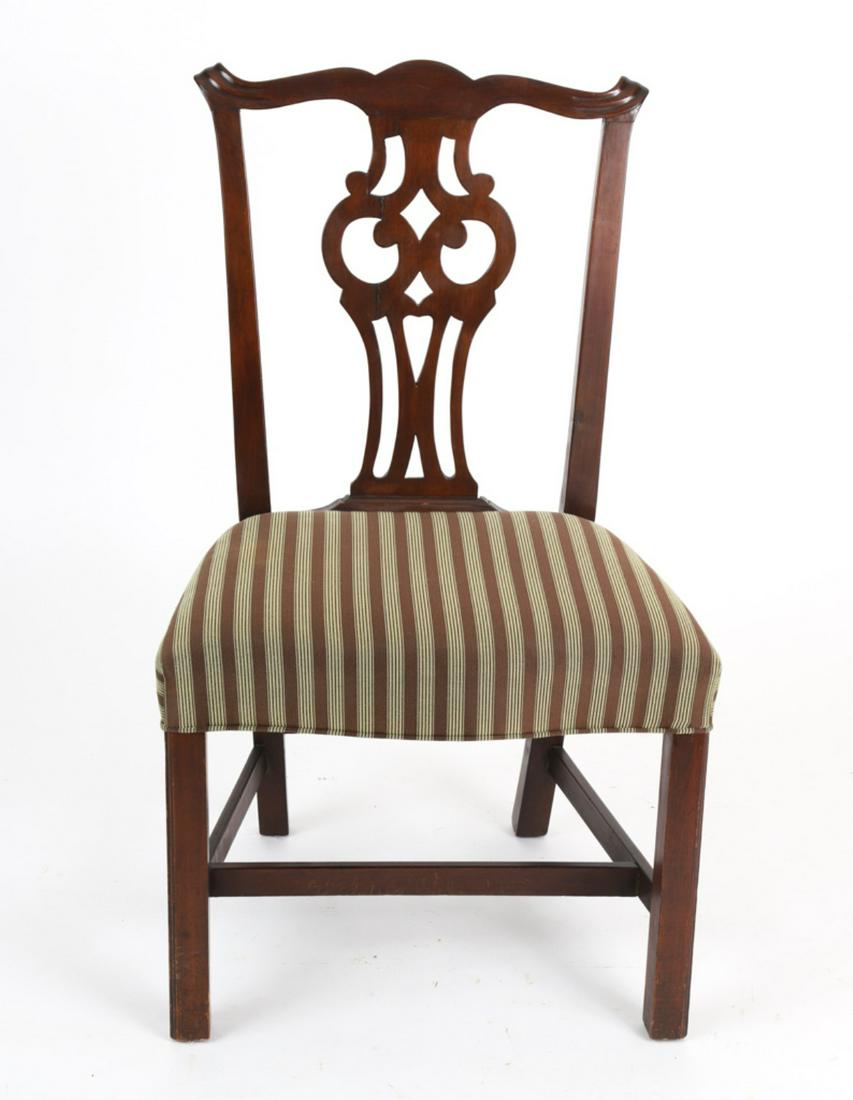 MASSACHUSETTS CHIPPENDALE SIDE CHAIR: Mahogany with carved ears above a pierced owl splat over a bowed front upholstered tight seat above beaded Marlborough legs joined by stretchers, late 18th century, 37 x 22 x 19 inches