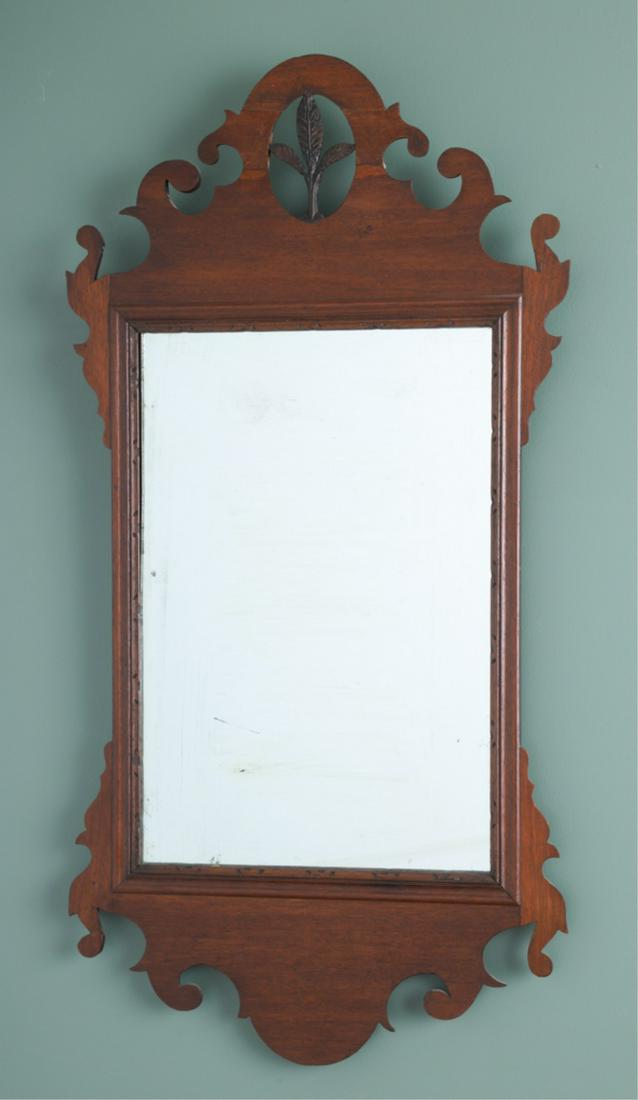 CHIPPENDALE MAHOGANY MIRROR: Having pierced crest with feathers, scroll design, 18th century, 33 x 16.5 inches