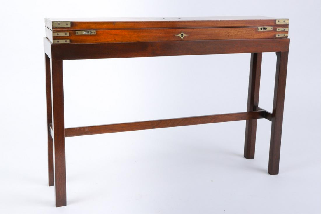 ENGLISH MAHOGANY GUN BOX ON STAND: Circa 1840, brass bound with recessed handle, interior lined in baze, upon a modern stand, box size, 3 x 33.5 x 8 inches, overall on stand, 24 inches