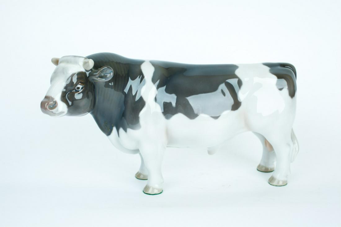PORCELAIN BULL FIGURE: gray and white, unmarked, 7 x 15 x 3 inches