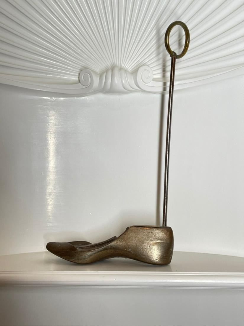 DOUGLAS BROTHERS LADY'S SHOE MOLD: Mounted with a handle used for a unique doorstop, 17 x 9.5 inches long