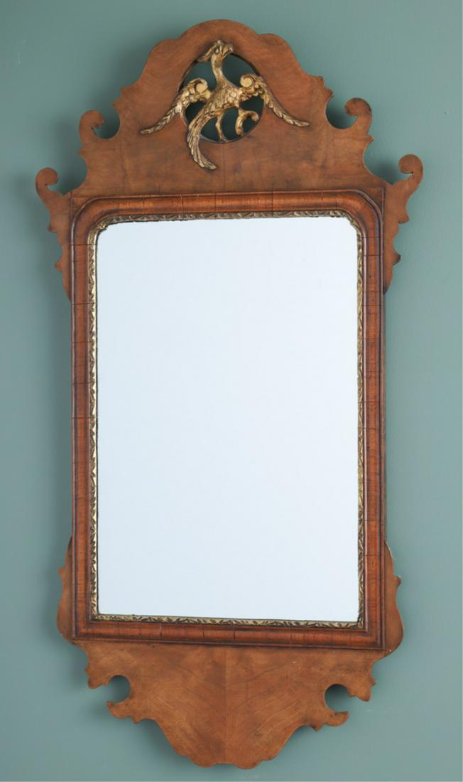 CHIPPENDALE STYLE PARTIAL GILT MIRROR: 20th century, mahogany with phoenix pierced crest, 31 x 17 inches
