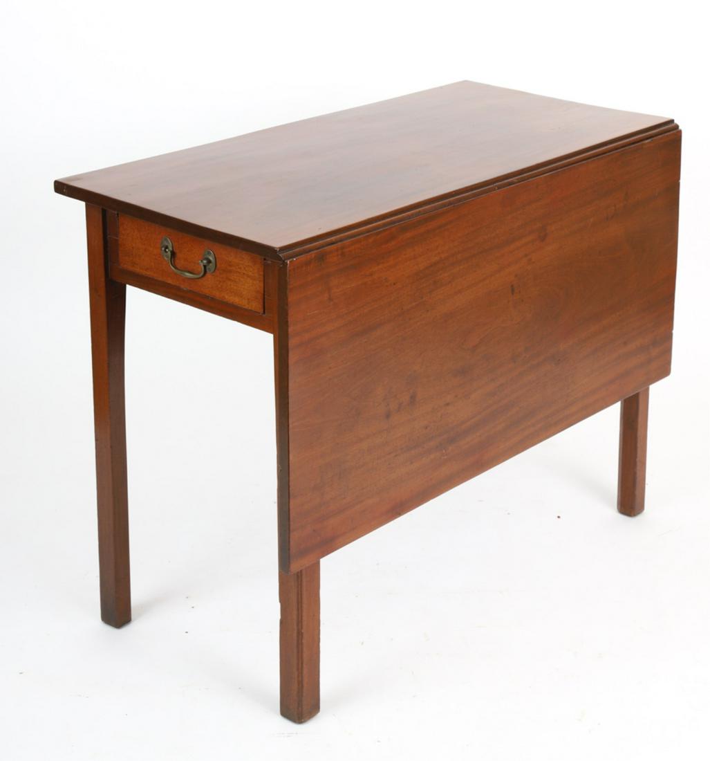 SINGLE DROP-LEAF CHIPPENDALE TABLE: Mahogany with apposing frieze drawers, raised on Marlborough legs, retaining period brasses, 28.5 x 38.5 x 17.5 inches, 35.5 inches extended