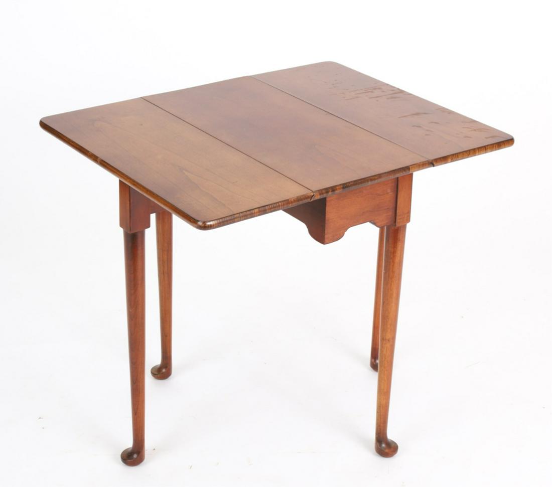 QUEEN ANNE STYLE SMALL CHERRY DROP-LEAF: Rounded corners, shaped apron, straight legs ending in pad feet, 22 x 20 x 10 inches, 26 inches extended