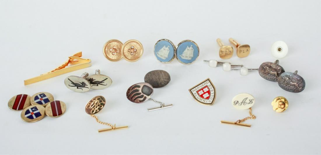 ITALIAN LEATHER BOX WITH CARTIER CUFFLINKS: Cufflinks mark 14k gold, monogrammed "PLA", cufflinks with cabochon stone, signed Krementz, several other cufflinks, tie tacks, clips and a Harvard pin