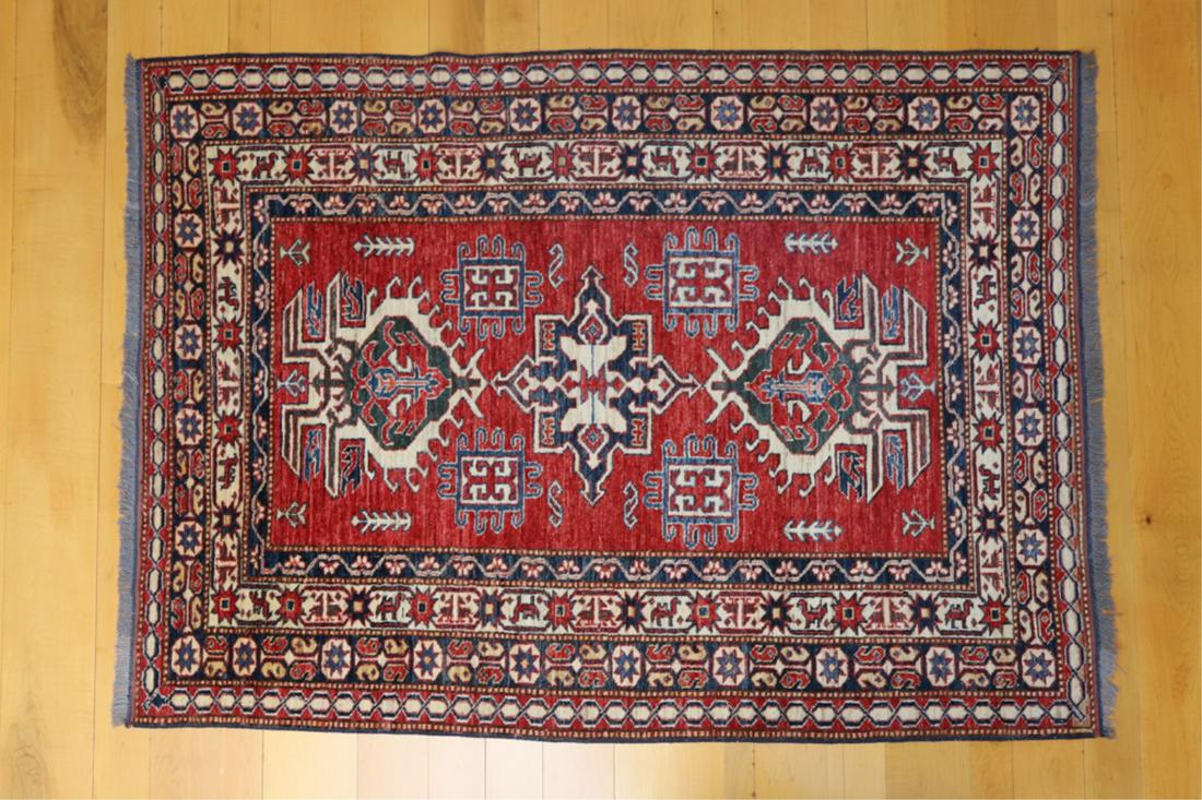MODERN HANDMADE PAKISTANI CARPET: Small area size with geometric patterns. 5 feet 9 inches x 4 feet 2 inches