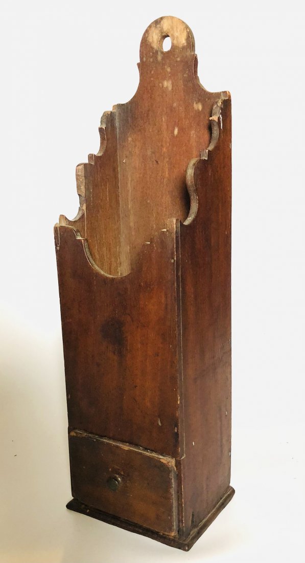 (18th c) (1) DRAWER MAHOGANY PIPE BOX: Shaped top with molded drawer and chestnut secondary wood. 20 inches. Purchased in Bristol, RI it is believed to have been originally made in Newport, RI. Condition: Wear to drawer front, small age cr