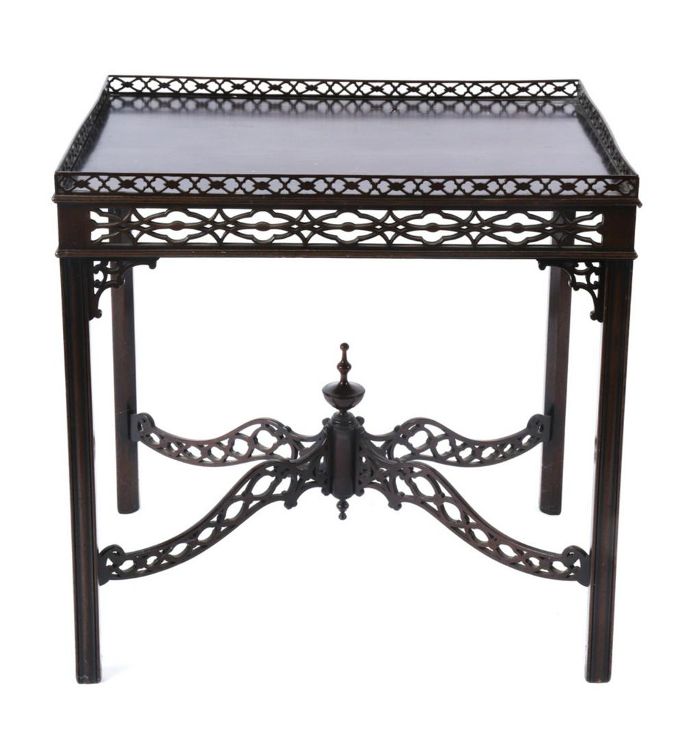 ENGLISH CHINESE CHIPPENDALE MAHOGANY SILVER TABLE: Pierced fretwork, apron and cross stretchers supported by molded legs with pierced bracket returns. 29”H x 29”L x 20 3/8”W Condition: Overall good, scratches, age cracks and finish inconsistenci