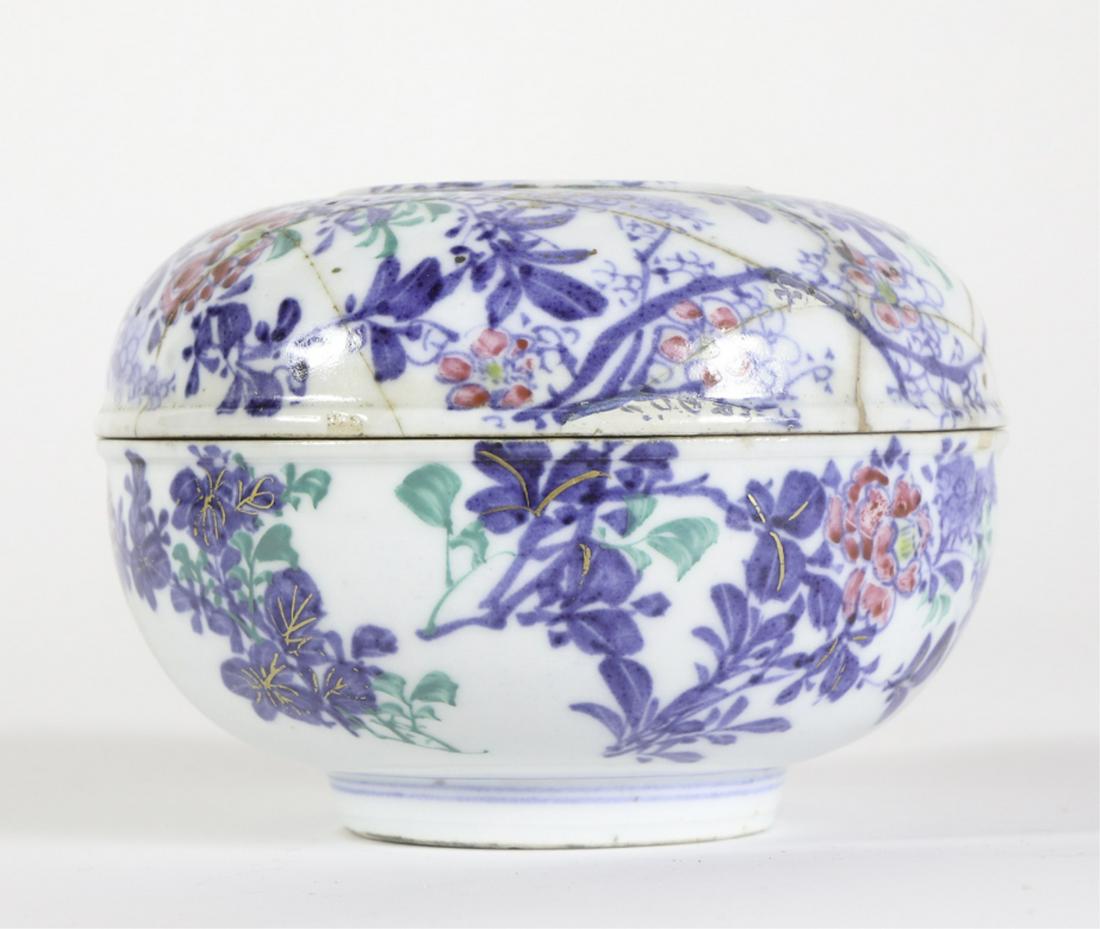 (19th c) CHINESE PORCELAIN COVERED BOWL - SIGNED: Decorated under glaze with an all-over polychrome floral pattern. 3 1/2 x 5 inches Condition: Multiple staple repair and rim chip to cover. Bowl has (2) hairlines. Temp No 6439