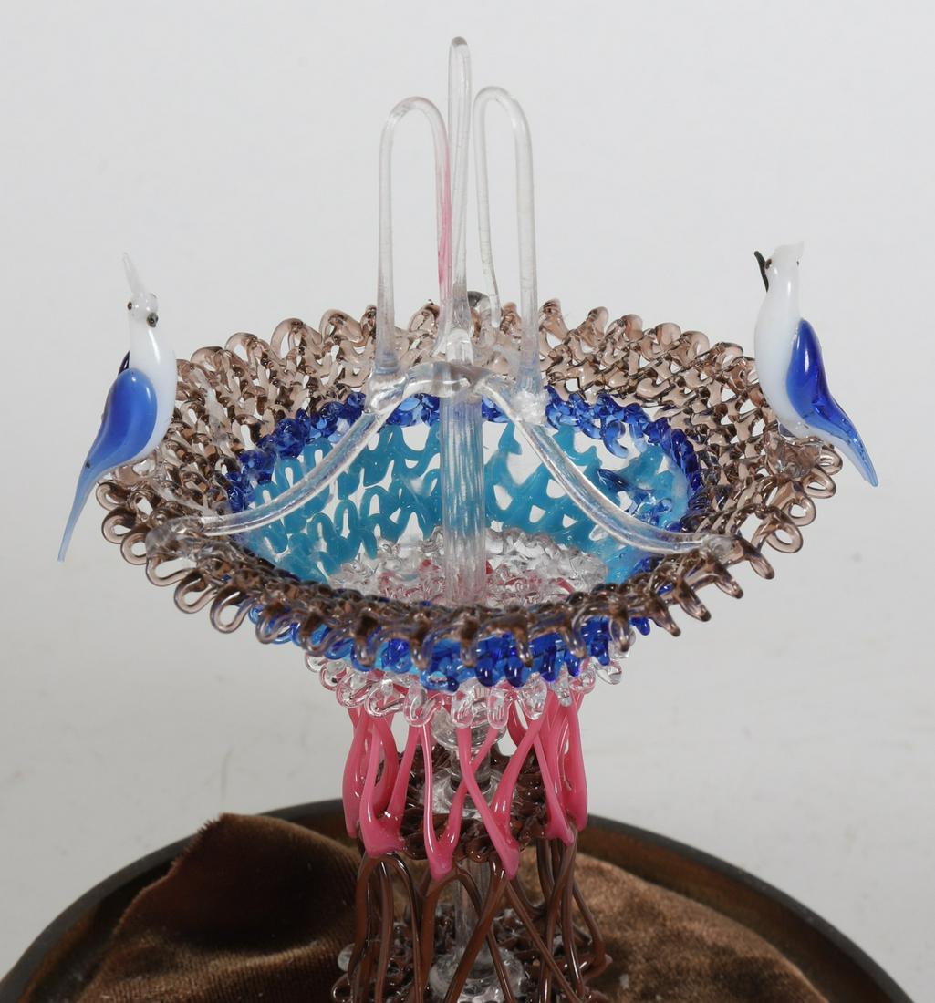 MINIATURE THREADED GLASS BIRDBATH in DOMED CASE: Bird bath with fountain and (2) perching birds is mounted into the base of a domed case. 6 1/2 inches (overall) Condition: Good Temp No 6423