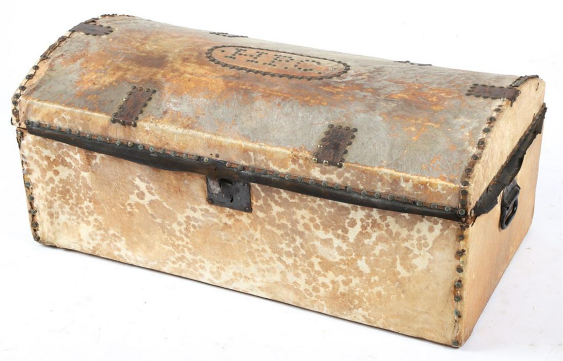 (19th c) HORSEHIDE-COVERED DOME TOP TRUNK: Bordered and initialed in brass tacks "H.P.C." 16 x 36 x 18 inches. Condition: Loss and scattered separation to hide. Interior tray absent Temp No 6227