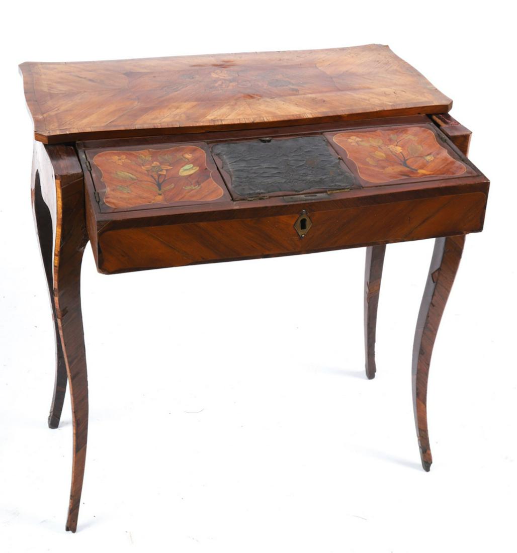 LOUIS XV MARQUETRY INLAY DRESSING TABLE: Parqueted table with serpentine top inlaid with (3) roses tied with a bow slides back to expose (3) compartments, the center covered with shaped leather can be adjusted to a personalized angle and is 