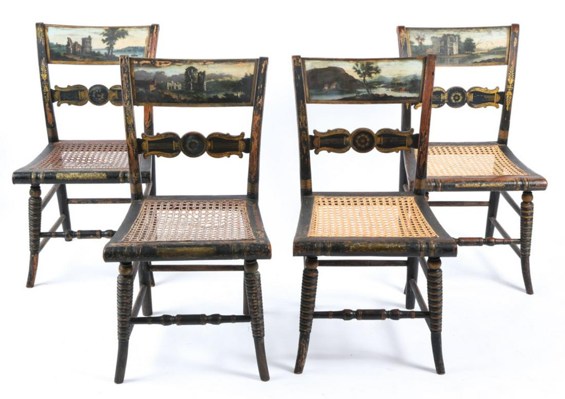 SET OF 4 LANDSCAPE PAINTED FANCY SHERATON CHAIRS: Each crest rail painted with a romantic landscape depicting ruins and rural landscapes and retain their original black and gilt decoration. Finely designed splats with floral medallion are supported b