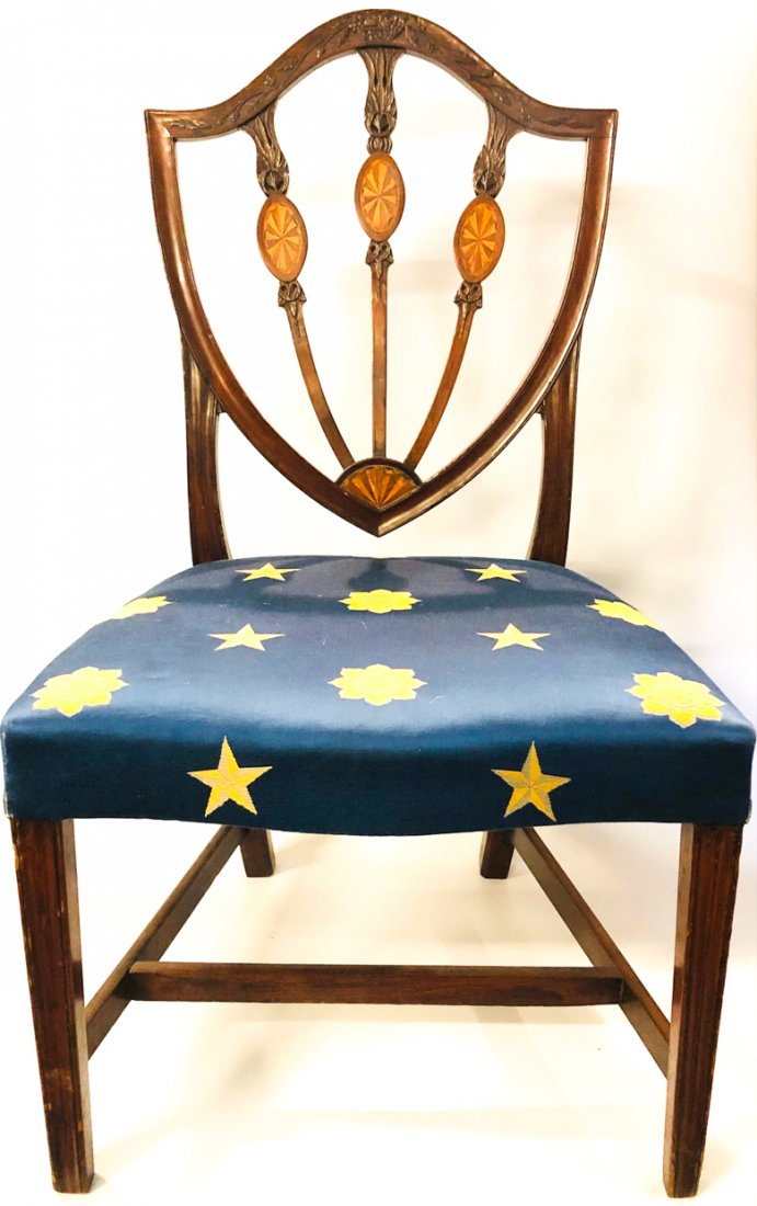 WILLIAM FISK SHIELD BACK MAHOGANY SIDE CHAIR: Elaborately carved and inlayed shield in the manner of Samuel McIntyre with basket of fruit and running acorn crest. 36 1/2 x 17 1/2 x 21 inches. seat height 16 1/2 inches. Note: Branded "WF" on back