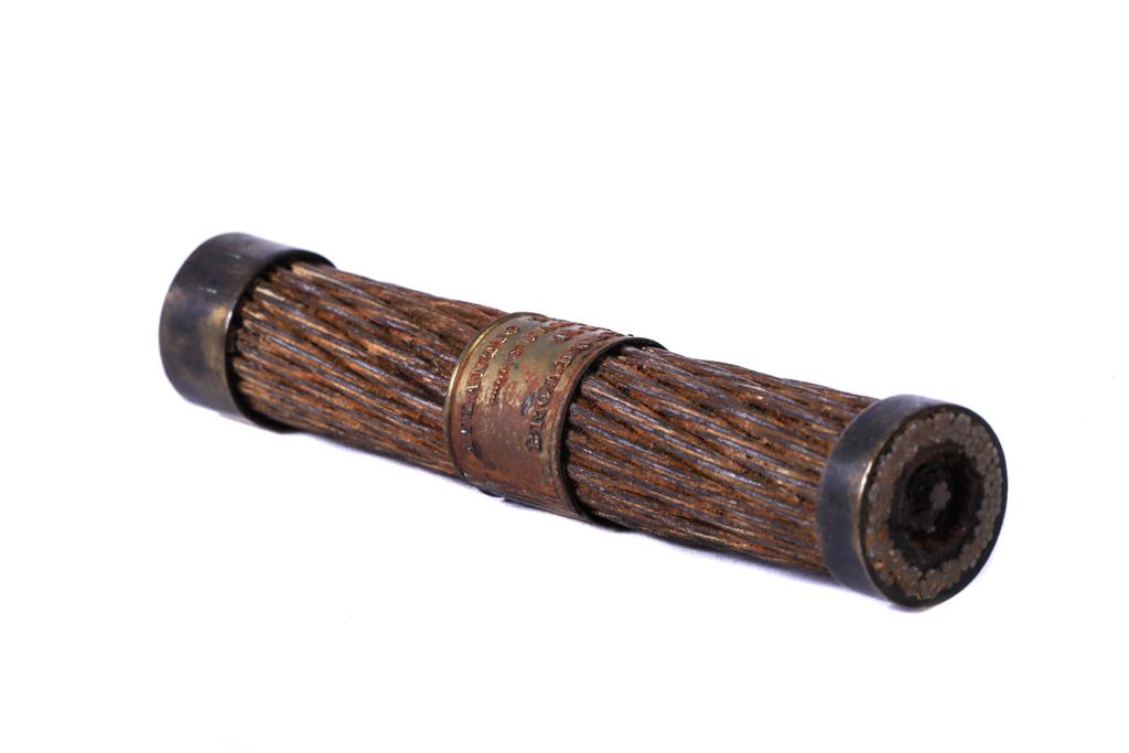 ATLANTIC TELEGRAPH CABLE GUARANTEED / TIFFANY & CO: Original cable link secured at ends by bronze collars. Center ring embossing identifies and guarantees authenticity by Tiffany and is dated 1858. (the first to cross the Atlantic)
