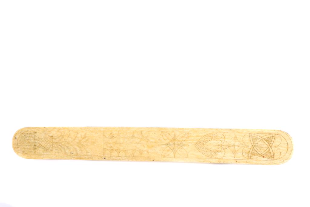 AMERICAN SAILOR SCRIMSHAW WHALEBONE BUSK: Engraved with a heart, potted plant and geometric designs. 12 3/4 inches. Please reference our full terms and conditions in regards to the purchase of this item. **May only be purchased by a Massachus