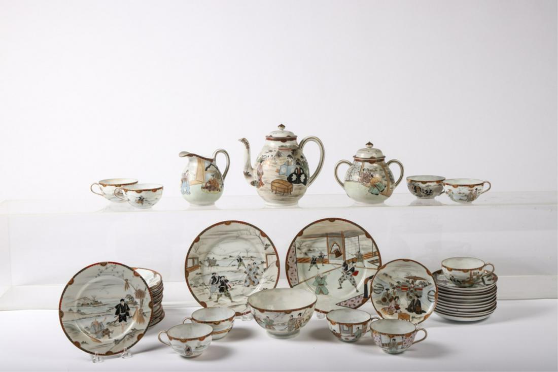 JAPANESE PORCELAIN TEA SET w/ SAMURAI MOTIF SIGNED: Including: Tea pot, sugar, creamer, waste bowl (hairline), (2) 8 1/2 inch plates, (12) 7 1/2 inch plates (1) rim chip and (1) hairline, (9) tea cups (with interior decorations) and (12) saucers.