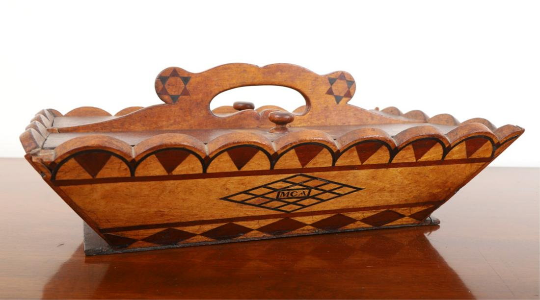FINELY INLAID UTENSIL BOX with SCALLOPED RIM: Wonderfully shaped handle inlaid with stars and corresponding inlay to knobbed covers. Canted sides are inlaid with arches, diamonds and stars. 5 x 13 x 8 1/4 inches.