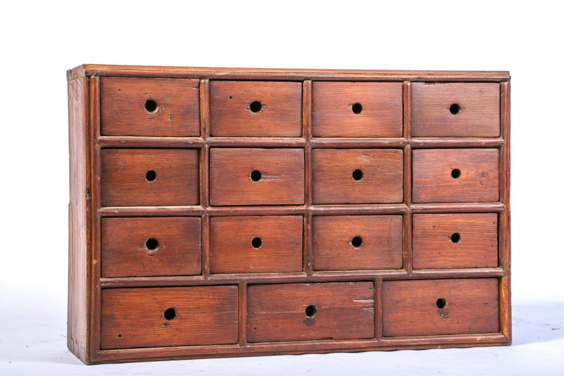 18TH CENTURY 15-DRAWER APOTHECARY: Mixed wood, finger pull drawers arranged in four banks of three over three, moulded front, 17 1/2 x 27 1/2 x 7 1/2 inches