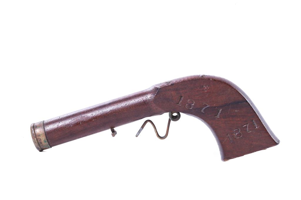 1871 YOUNG SPORTSMAN SPRING LOADED TOY PISTOL: Rosewood and brass. 5 3/4 inches. Possibly a unique prototype
