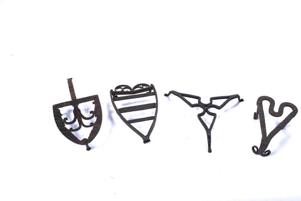 (4) WROUGHT IRON TRIVETS / IRON TRIVETS (1 of 2)